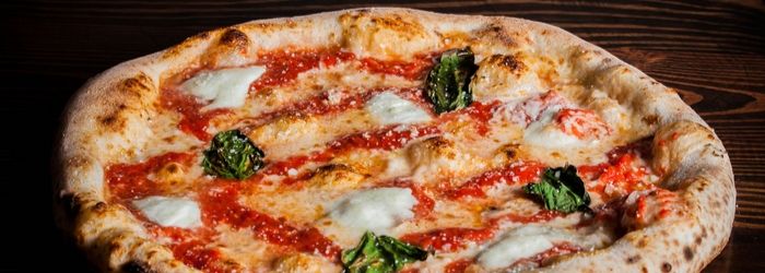 De Nápoles a Nueva York: el origen de la pizza que no conocías